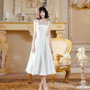 French satin irregular suspender dress with feminine temperament  princess waist cinching niche dress  champagne white S