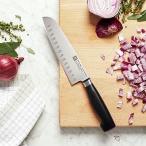 ZWILLING Four Star 7-inch Hollow Edge Santoku Knife
