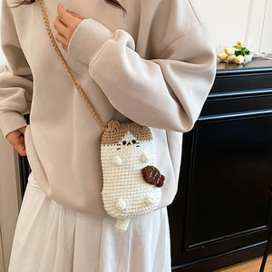 【中國直郵】 HSPM 秋冬新款手工編織可愛貓咪手機包毛線鉤針織禮物零錢包斜挎包 卡其色 F 1個