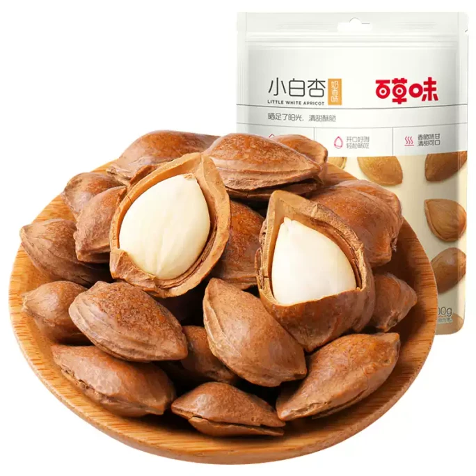 Hand peeled small white apricots with a hundred herbs flavor, 100g*1dag nuts, dried fruits, large almonds, crispy and open mouth apricot kernel snacks, specialty hand peeled