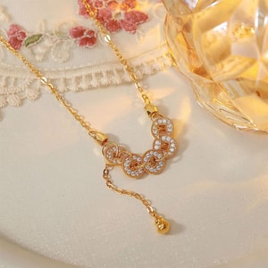 【中国直送】HSPM 新作 絶妙で高級なニッチデザイン 古代五帝コインネックレス ダイヤモンドインレイ付き (1個)