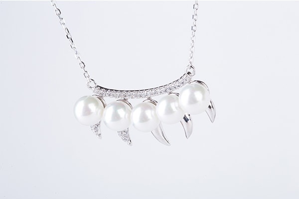 Sterling Silver Teeth and Pearls Necklace