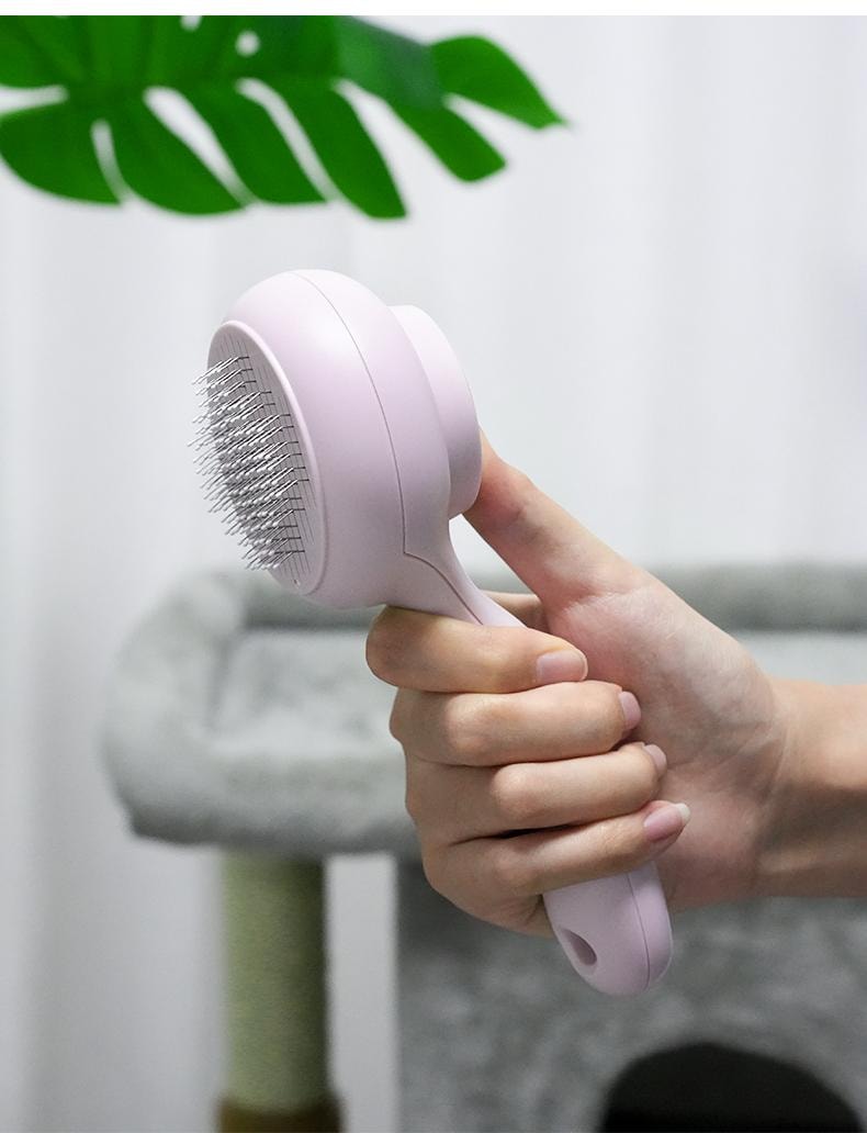  得乐 【德国红点设计大奖作品】大眼萌除毛梳一把 宠物按摩梳毛专用梳子宠物清洁美容用品去浮毛 【一键回收梳齿,毛发一片脱落】